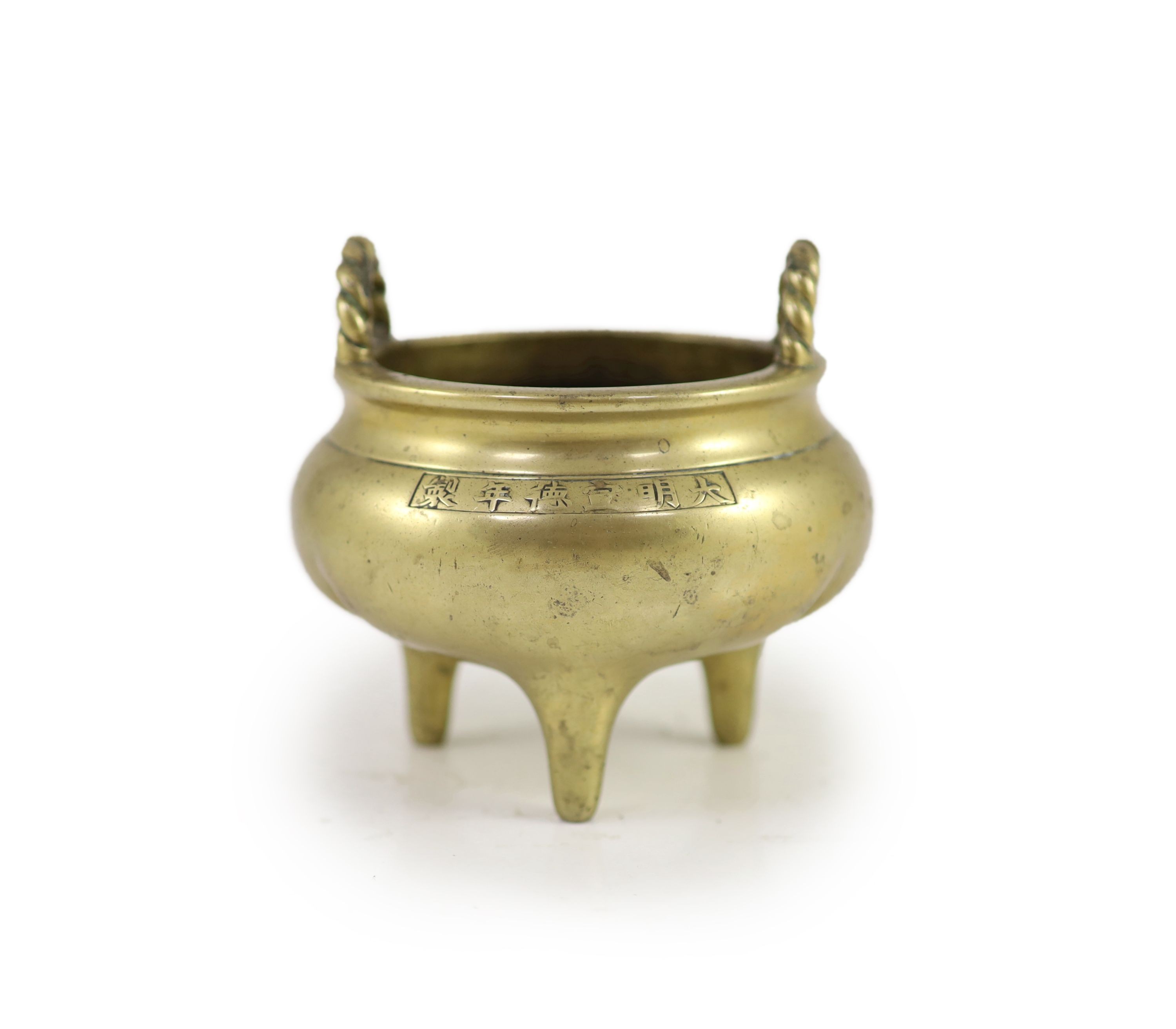 A Chinese bronze tripod censer, 18th/19th century, 11.5cm diameter